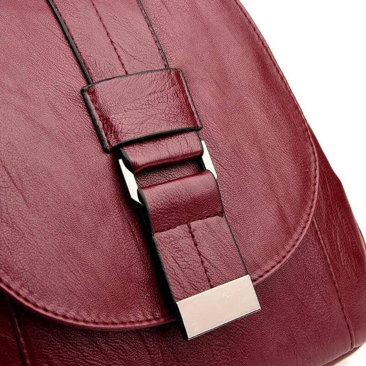 Chic multi-color water resistant women's leather backpack, a versatile everyday accessory.