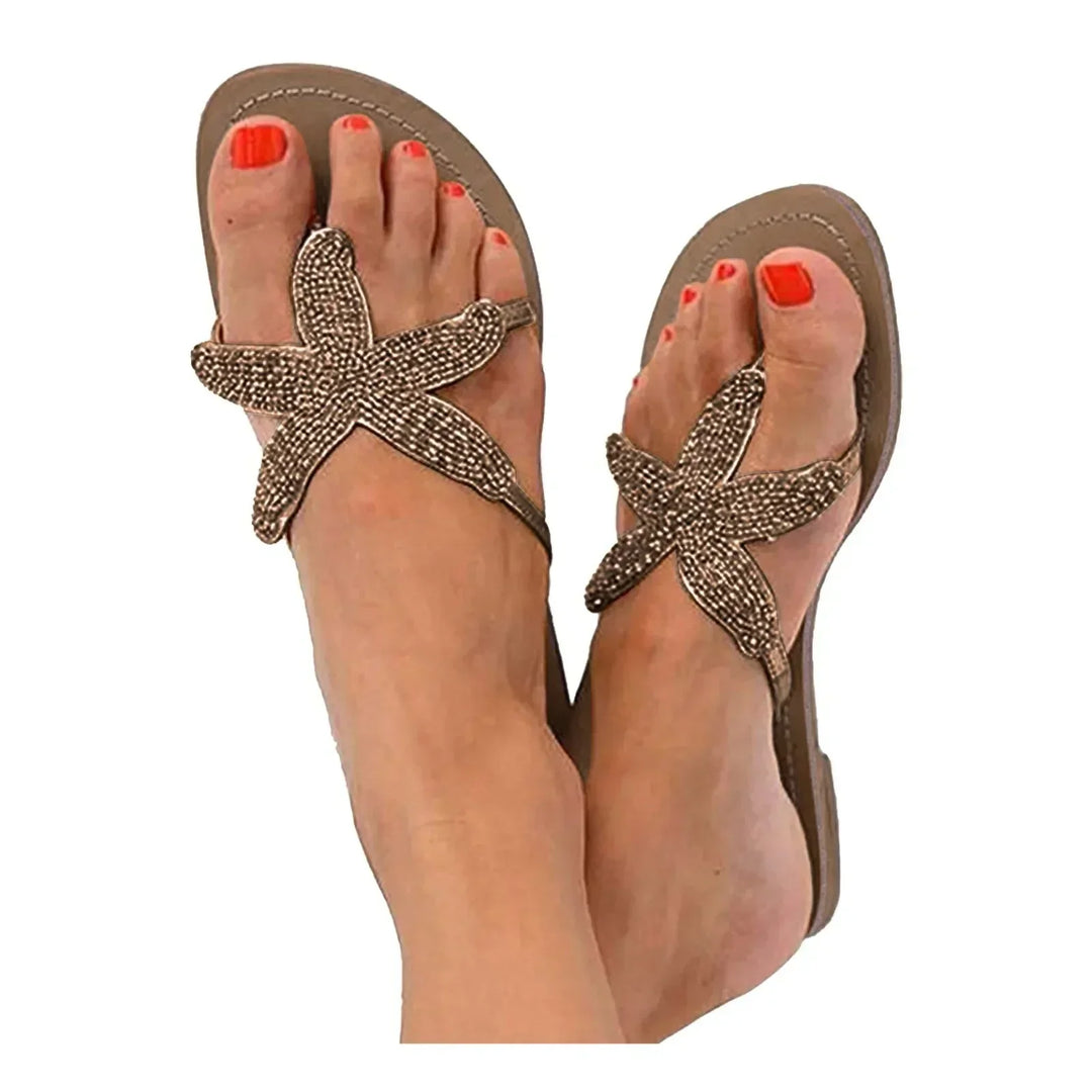 Fashionable Primrose women's slide sandals with metallic accents, offering effortless summer comfort.