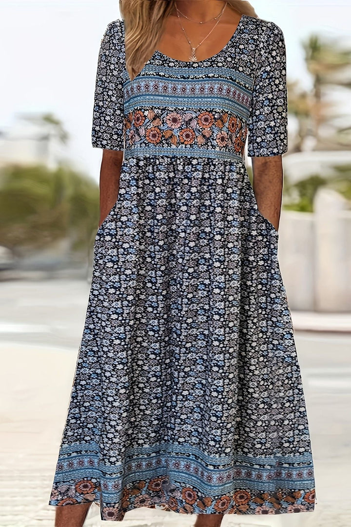 Comfortable patterned midi dress for women. Relaxed fit, ideal for effortless casual summer style.