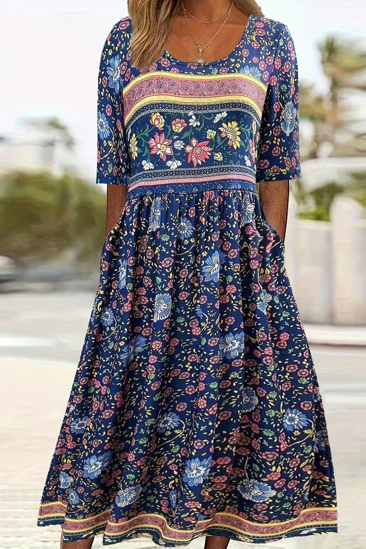 Stylish women's printed midi dress with a relaxed fit. Great for casual wear or summer outings.