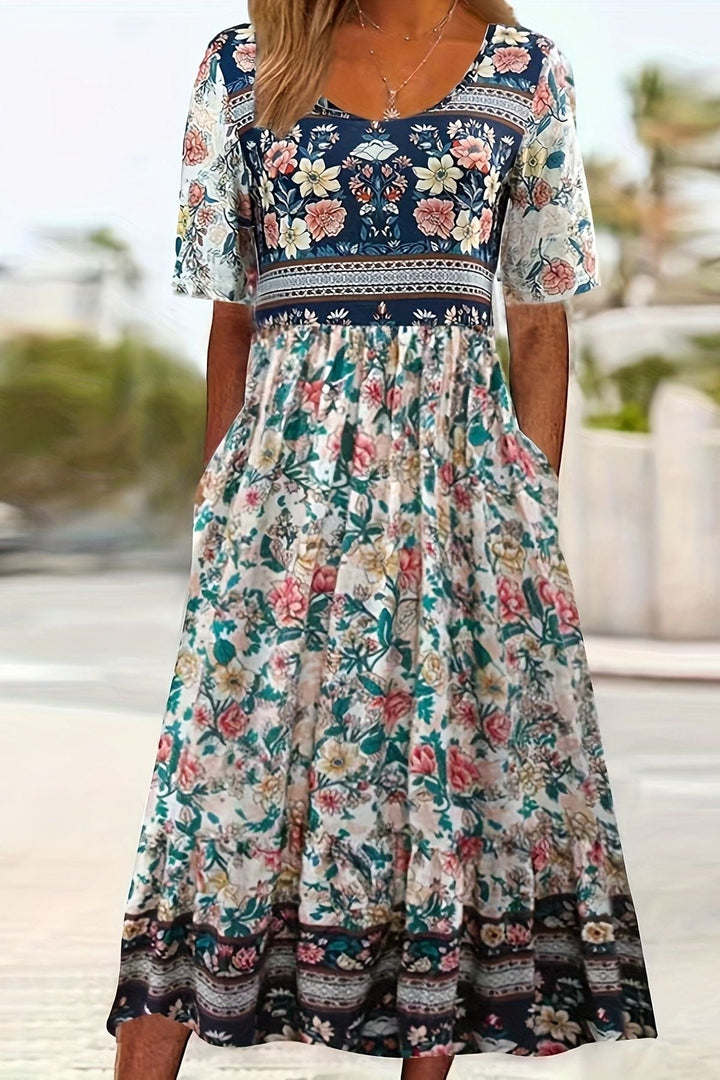 Effortless women's printed midi dress. Relaxed, flowy design ensures comfort & versatile summer style.