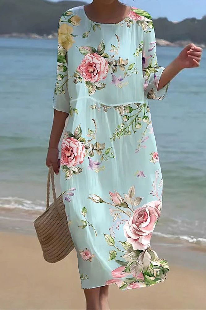 Women's printed relaxed midi dress with a flowing silhouette, perfect for effortless casual and summer style.