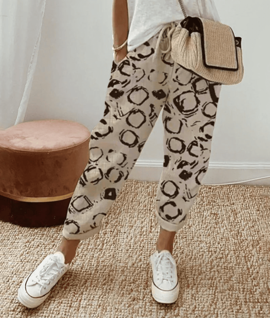 Close-up of comfortable women's printed pants, highlighting soft fabric and adjustable waistband detail.