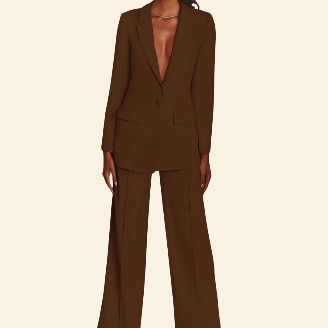 Stylish women's work outfit featuring a structured blazer and comfortable wide leg business pants.