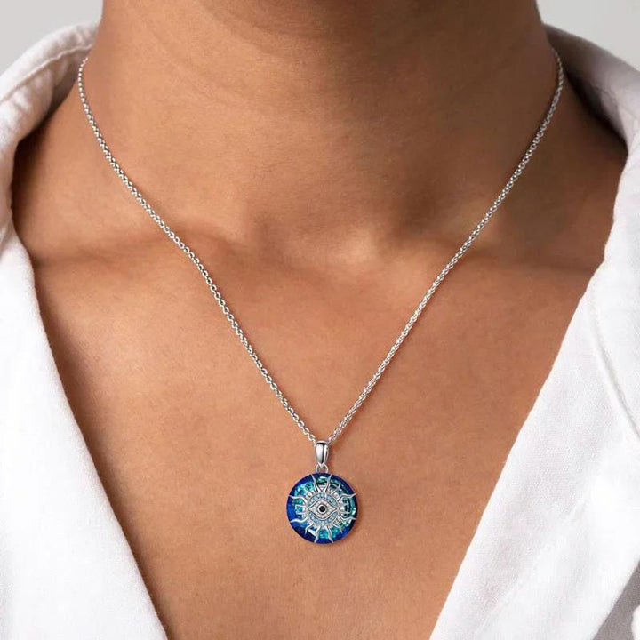 Stylish Women's Protective Evil Eye Necklace. A spiritual amulet & fashion jewelry symbolizing strength & protection.