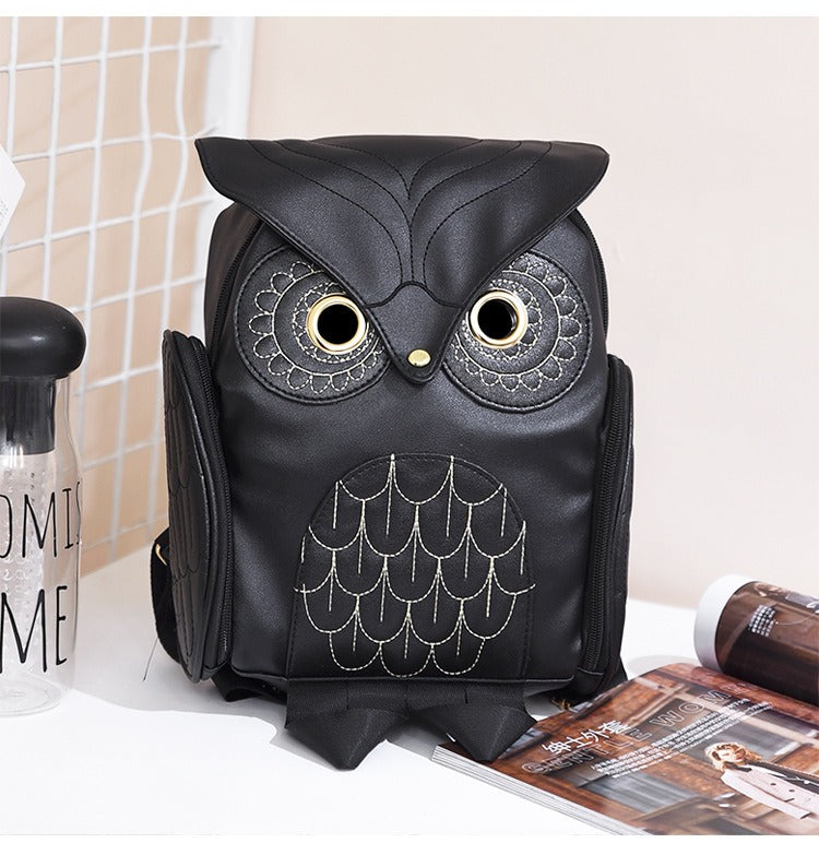 Women's PU leather owl print backpack with multi-pocket design for fashion and travel.