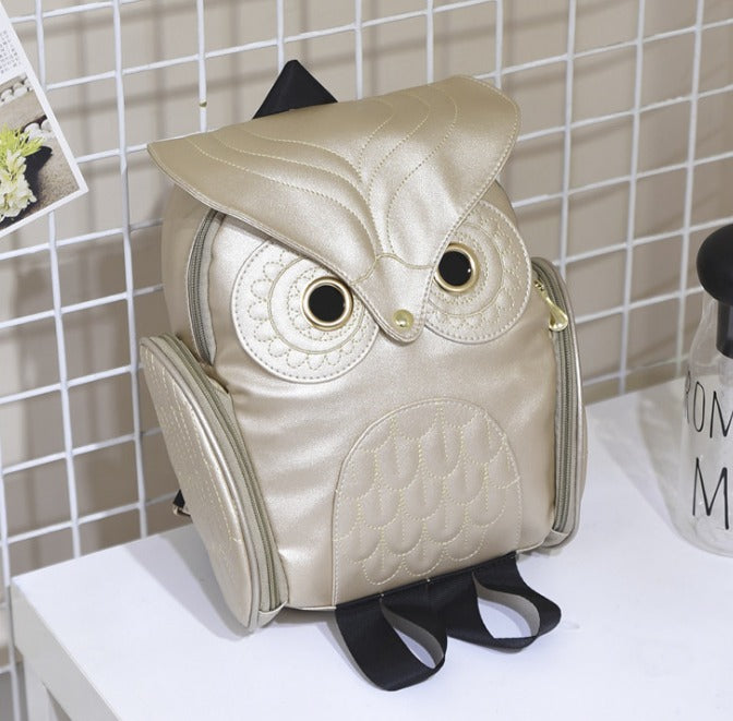 Trendy PU leather owl print daypack for women, featuring secure and accessible pockets.