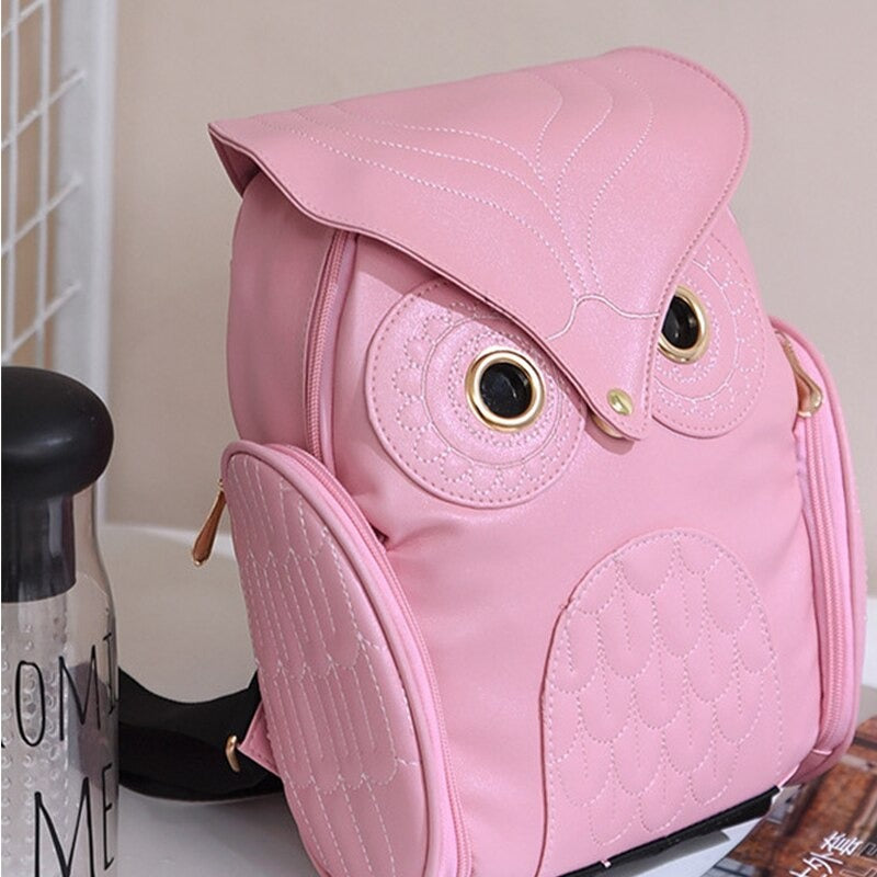 Close-up of the intricate owl print on a multi-pocket PU leather women's backpack.