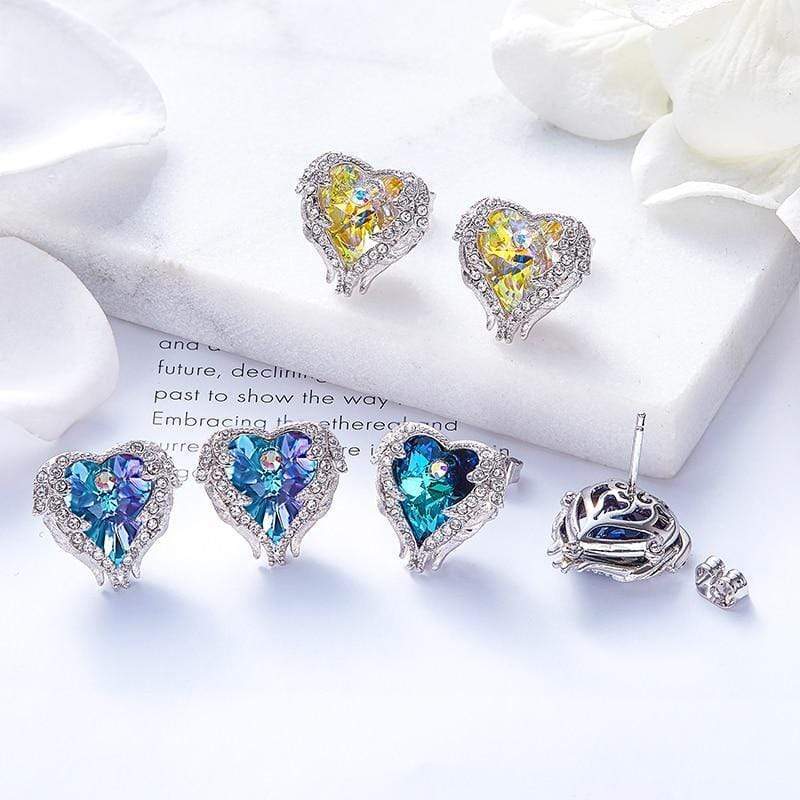 Stylish women's angel wing & heart crystal earrings. Dazzling purple & blue spiritual jewelry for women.