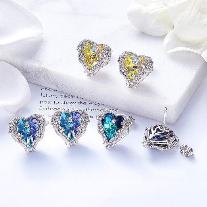 Stylish women's angel wing & heart crystal earrings. Dazzling purple & blue spiritual jewelry for women.