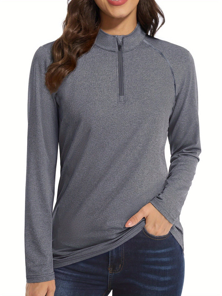 Women's quarter-zip long sleeve sports shirt for running & workouts.