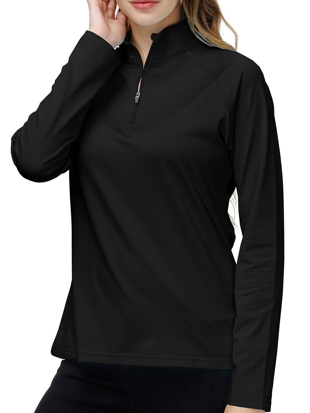 High-performance women's sports shirt, long sleeve & quarter zip for active wear.