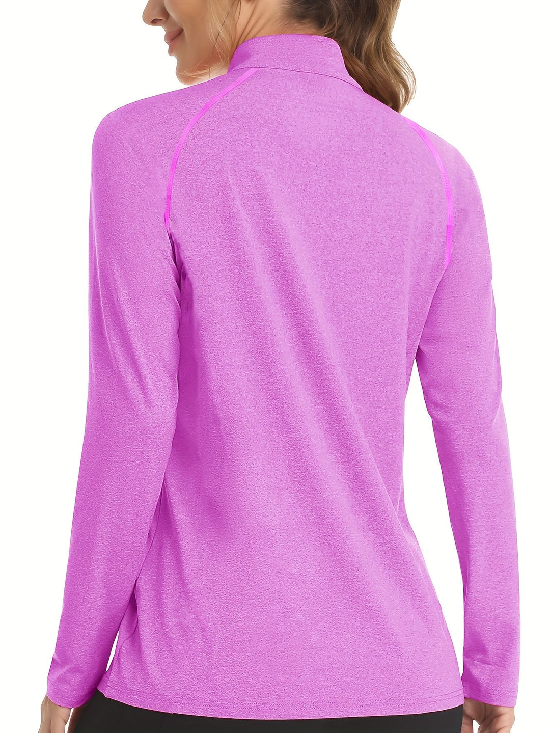 Nadira women's long sleeve quarter zip top, ideal for active performance.