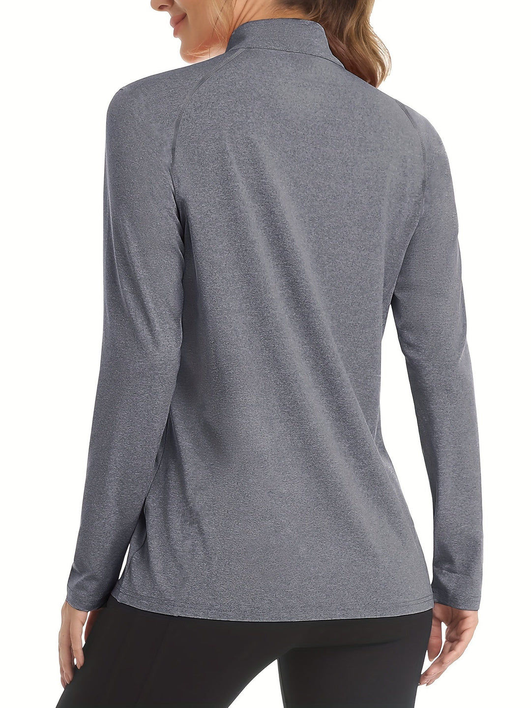Women's fitness gear: long sleeve sports shirt with high collar, versatile for gym.
