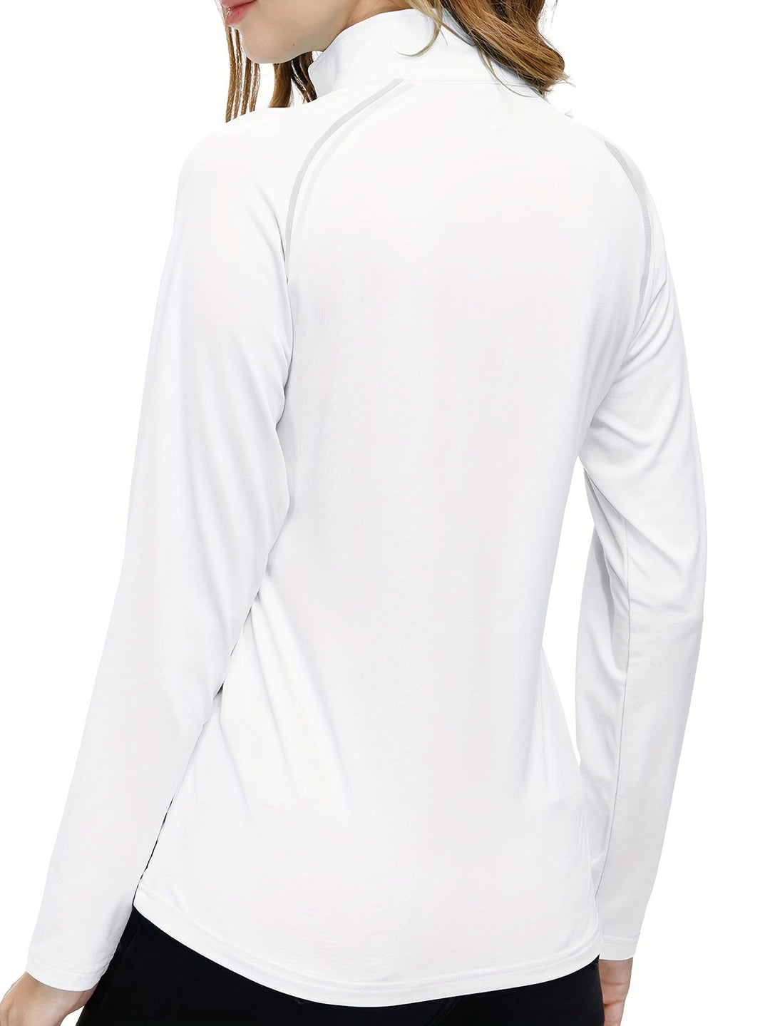 Stylish women's activewear long sleeve top, quarter-zip design for athletic training.