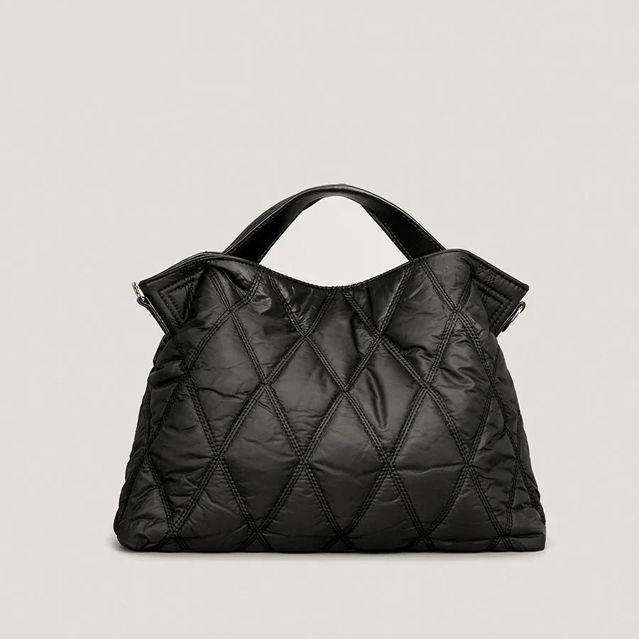 Women's quilted comfort tote bag in soft cotton down, perfect for everyday use & a stylish fashion accessory.