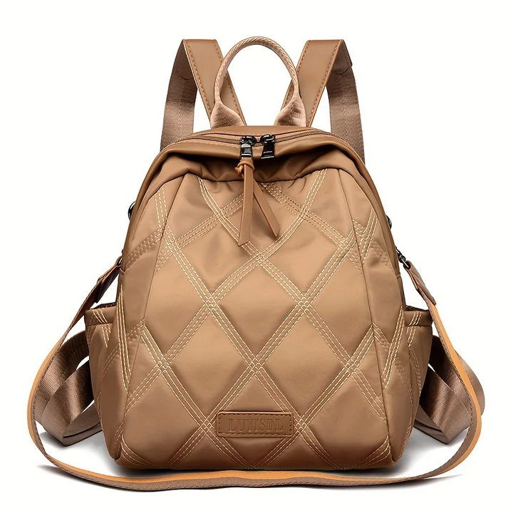 Women's quilted nylon convertible backpack, stylish & versatile for everyday and travel.