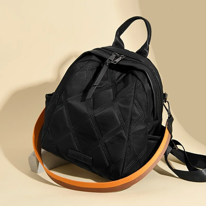 Chic women's quilted nylon convertible backpack. A stylish and versatile travel bag for women.