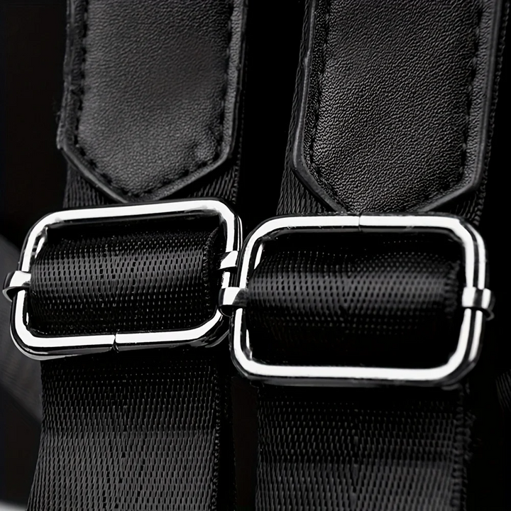 Woman with a stylish black quilted convertible backpack, perfect for travel & everyday versatile use.