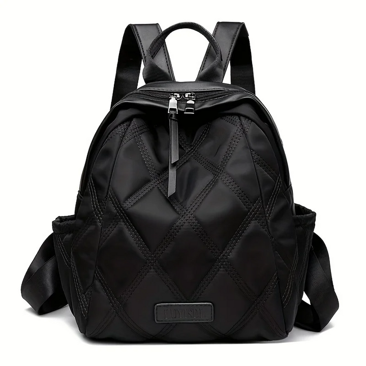 Black quilted nylon women's convertible backpack, a versatile shoulder, crossbody, and travel bag.