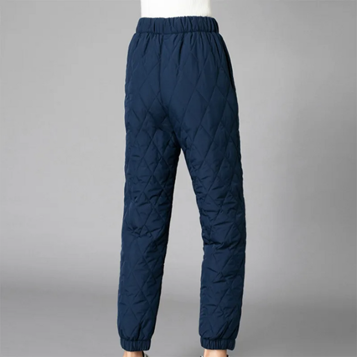 High-rise women's quilted puffer joggers, ensuring a cozy, comfortable & chic fit.