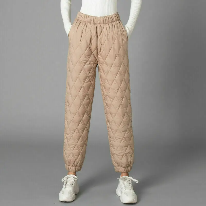 Stylish women's quilted puffer pants, perfect for cozy everyday wear & winter fashion.