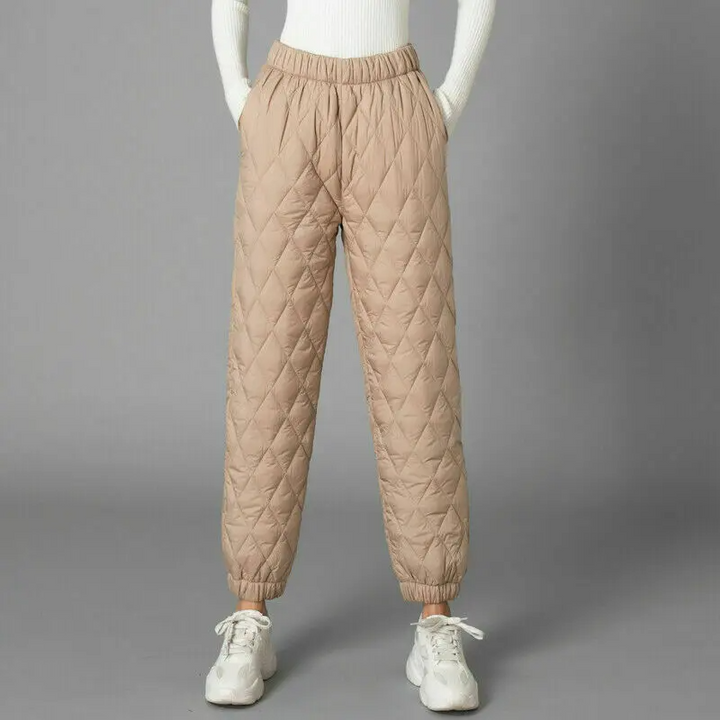 Stylish women's quilted puffer pants, perfect for cozy everyday wear & winter fashion.