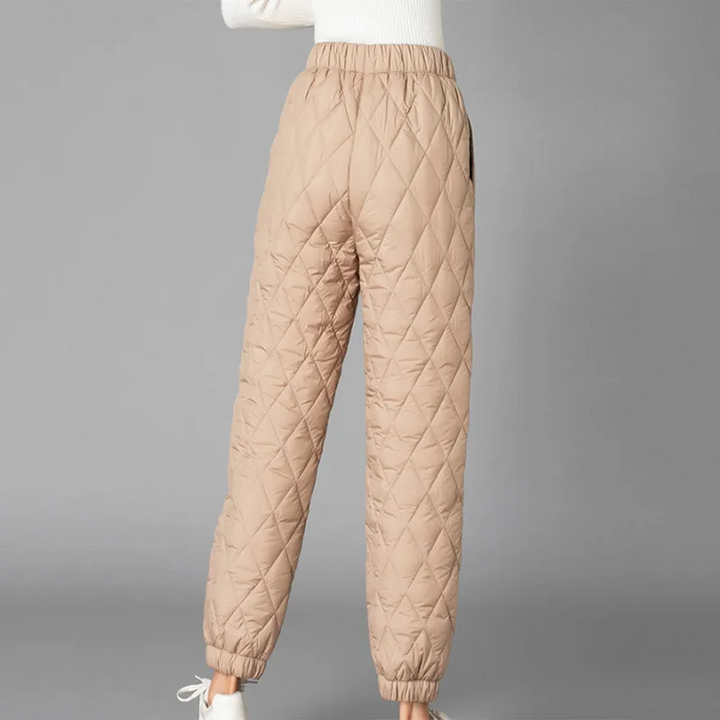 Women's warm quilted puffer joggers for cozy, chic winter outfits & comfortable lounging.