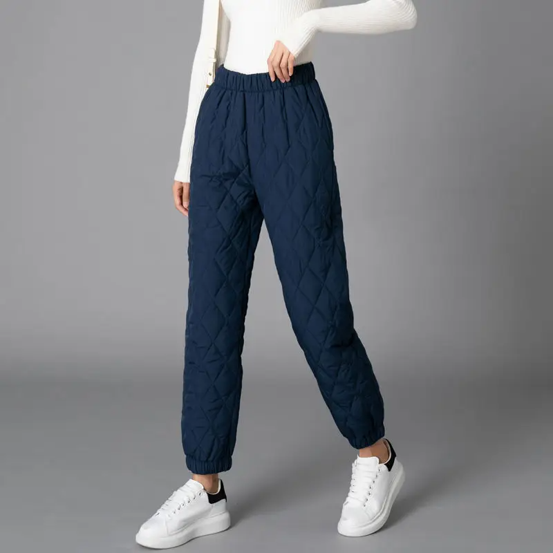 Women's quilted puffer joggers, athletic casual style, warm & cozy winter bottoms.