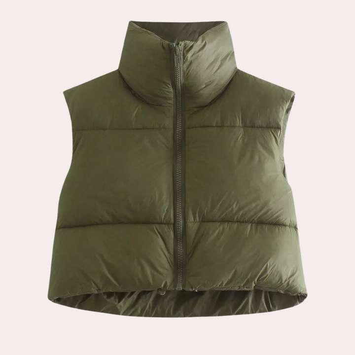 Elegant women's quilted vest, a short bodywarmer design. Perfect for adding a touch of warmth & style to any outfit.