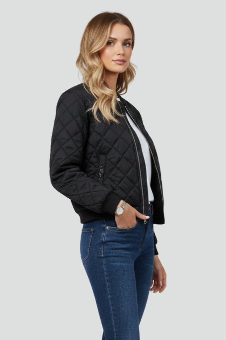 Versatile women's quilted jacket with full zip, ideal for effortless layering in spring or fall fashion.