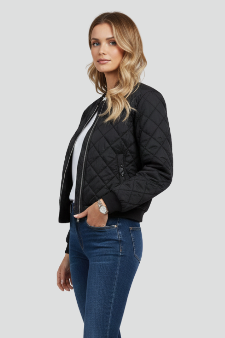 Comfortable women's quilted jacket with full front zip. Relaxed fit for casual outerwear & everyday style.