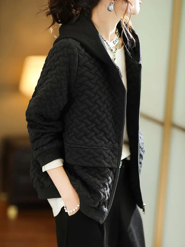 Versatile women's quilted zip-up hoodie, perfect for fall and winter, combining style and warmth.