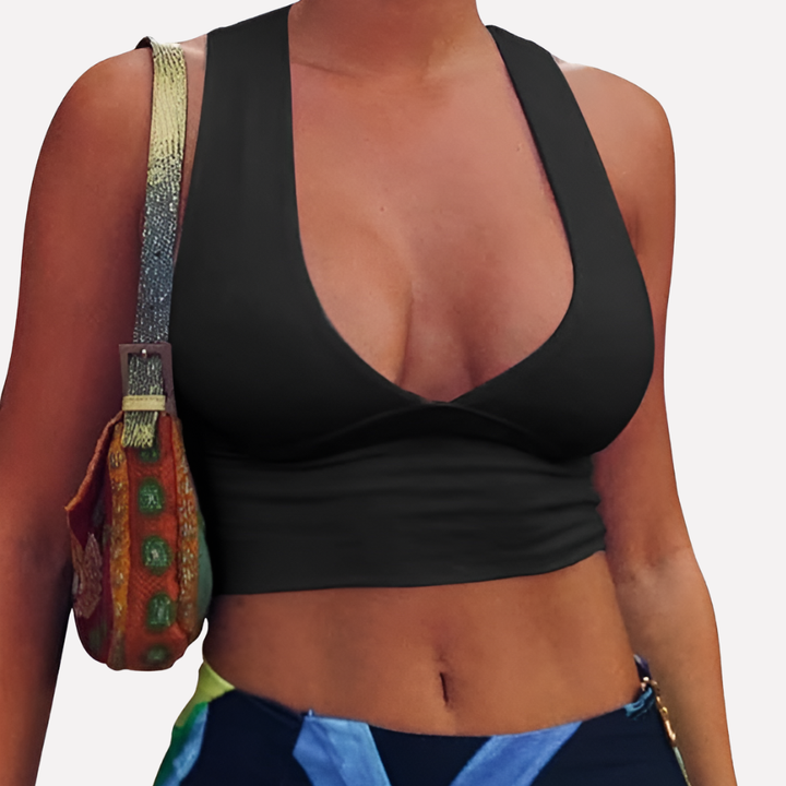 Trendy women's racerback crop top featuring a chic cutout design and deep V-neck, perfect for summer fashion.