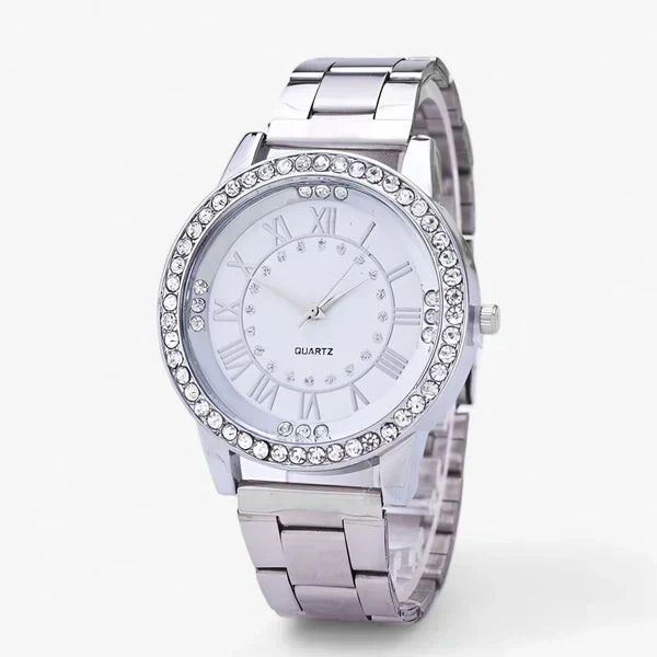 Full view of women's luxury diamond watch, available in silver or rose gold stainless steel. A versatile accessory.