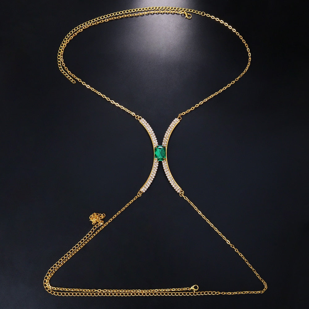Shimmering silver rhinestone body chain necklace for women, a glamorous crystal jewelry piece for evening wear.