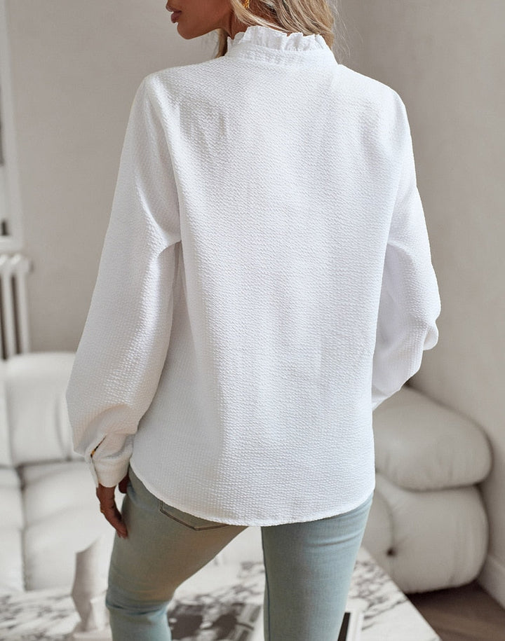 Casual yet bold women's blouse with a unique rebellious print, perfect for a fashion statement.