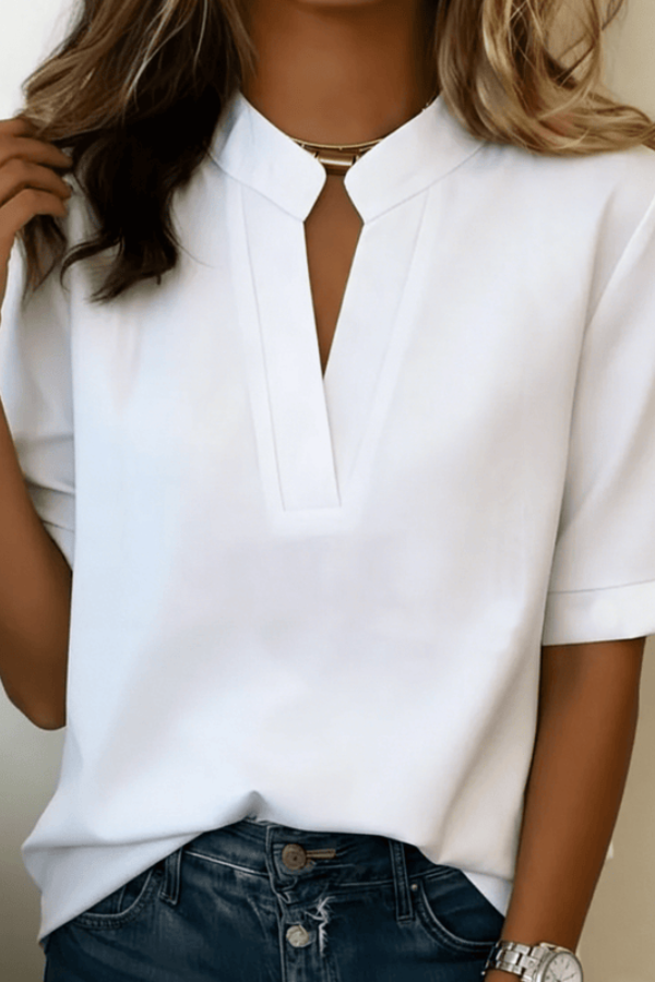 Refined women's long sleeve V-neck top, an elegant and comfortable blouse for versatile styling.