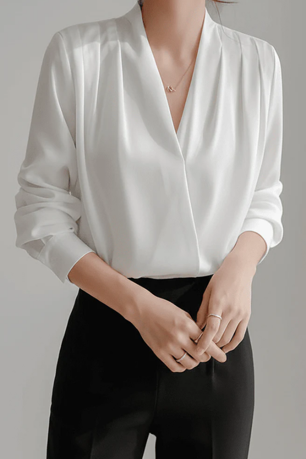 Elegant women's long sleeve wrap blouse. Effortless refined style for chic everyday wear or comfortable office top.