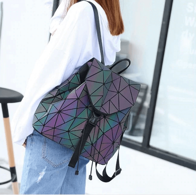 Women's reflective geometric backpack. A stylish, color-changing luminous bag with a unique fashion design.