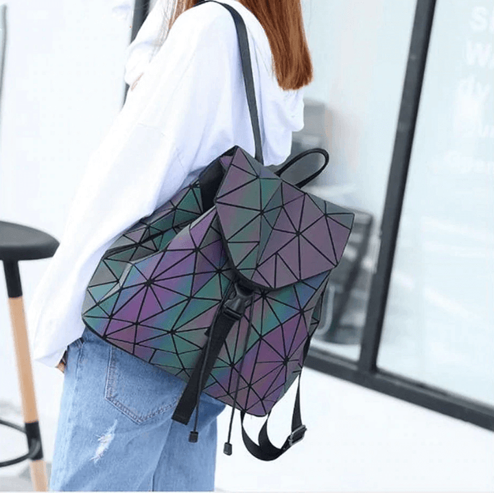 Women's reflective geometric backpack. A stylish, color-changing luminous bag with a unique fashion design.