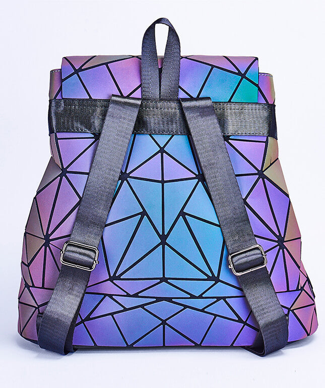 Stylish women's travel backpack with a reflective geometric pattern. Color-changing luminous bag for unique daily adventures.