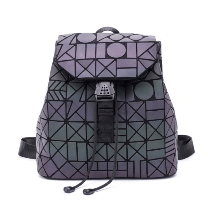 Woman wearing a stylish reflective geometric color-changing backpack. Luminous fashion bag for a modern look.