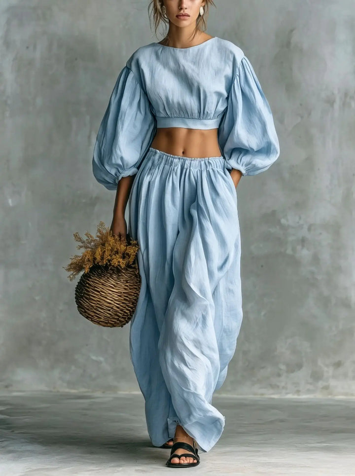 Women's relaxed balloon sleeve two-piece trouser set with wide-leg pants. Casual, comfortable fashion.