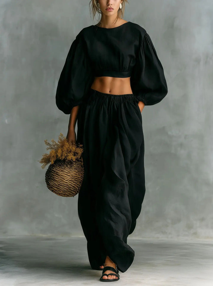 Stylish women's balloon sleeve two-piece set featuring a relaxed fit and wide leg trousers, perfect for vacation.