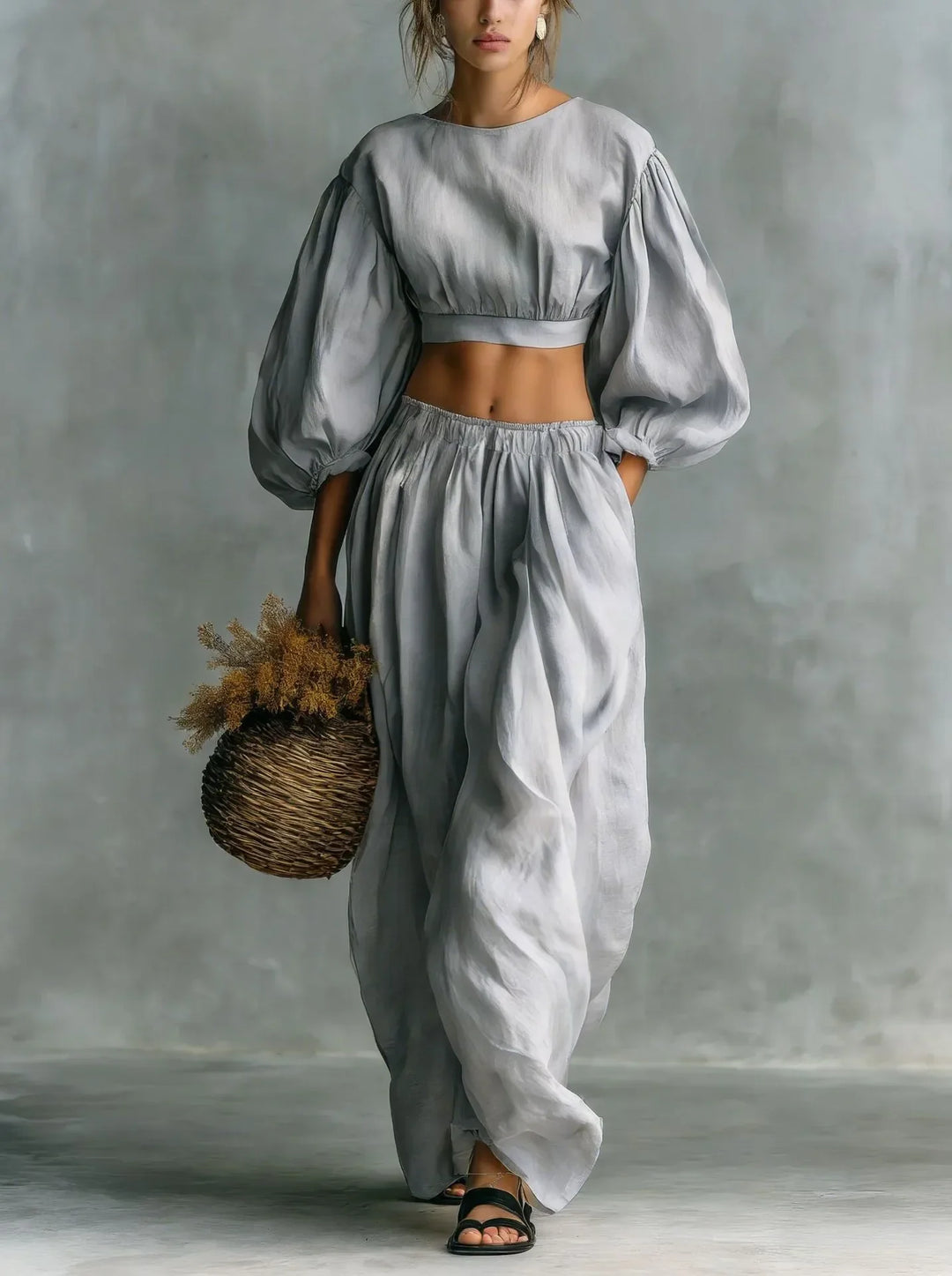 Comfortable women's relaxed fit trouser set with elegant balloon sleeves. A versatile two-piece casual outfit.