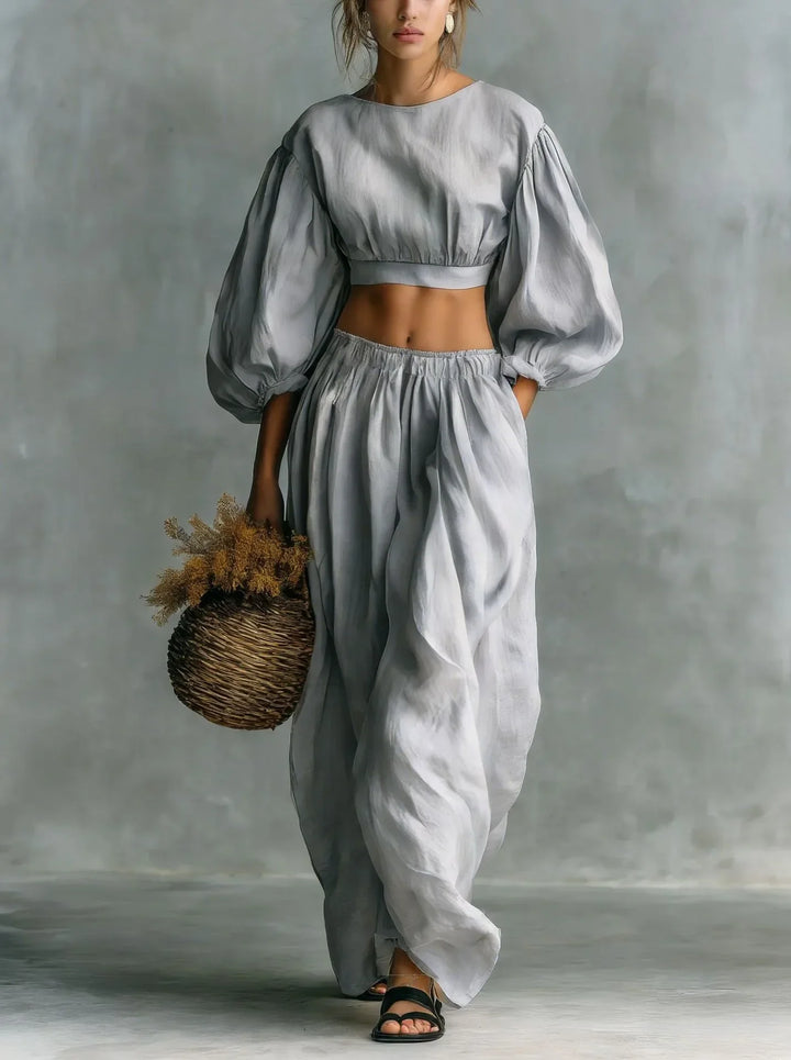 Comfortable women's relaxed fit trouser set with elegant balloon sleeves. A versatile two-piece casual outfit.