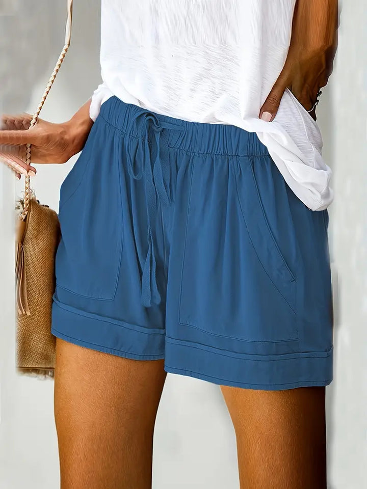 Versatile women's casual shorts, high-rise and relaxed fit, perfect for everyday summer comfort.