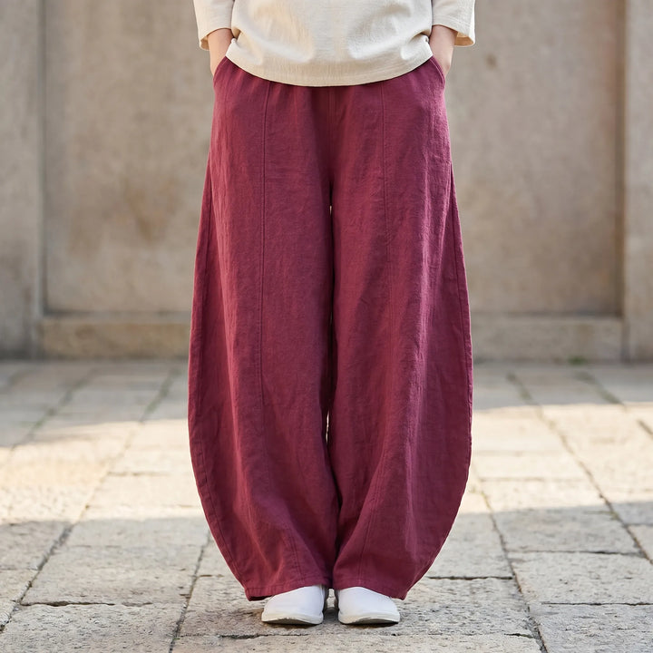 Women's relaxed fit barrel pants, wide leg, elastic waist. Perfect for casual summer style and comfort.