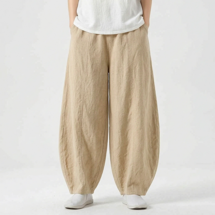Distinctive women's barrel pants, relaxed wide leg, elastic waist, blending style & comfort seamlessly.